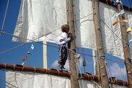 sailboat-mats-flags-climbing-boy-598365.jpg