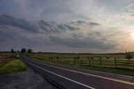 road-clouds-pasture-fence-647018.jpg