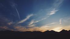 sunset-silhouette-mountain-range-828603.jpg