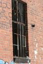 brick-wall-window-graffiti-facade-647523.jpg