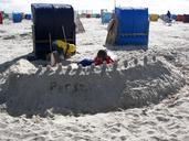 beach-children-play-sandburg-sand-199916.jpg