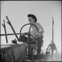 Monterey_County,_California._Rural_youth._Mechanization,_the_agricultural_employee._At_the_wheel_of_a_farm-all_tractor_-_NARA_-_532242.tif