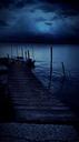 night-boardwalk-water-sea-boot-411115.jpg