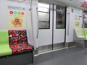 Downtown_Line_train_priority_seats_with_cartoons.jpg