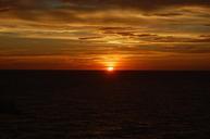 sunset-horizon-ocean-ship-sky-500386.jpg