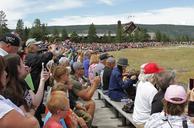 Visitors_watching_Old_Faithful_Geyser_erupting._Old_Faithful_Inn_in_background_5640.jpg