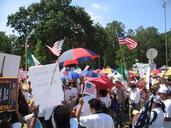 A day without immigrants - protesters, flags, news truck.jpg