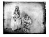 Two_Pima_Indian_mothers,_Nellie_Law_and_Lulu_Gage,_each_holding_a_baby,_1904_(CHS-3605).jpg