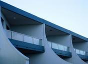 building-white-blue-curved-206026.jpg