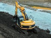 excavator-river-torrent-machinery-613276.jpg