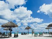 beach-sand-umbrellas-lounge-chairs-923602.jpg