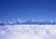 alpine-landscape-with-peaks-covered-by-snow-and-clouds.jpg