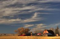 farm-prairie-clouds-barn-rural-614442.jpg