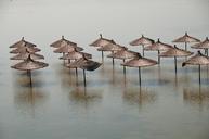 flood-umbrellas-brown-water-943967.jpg