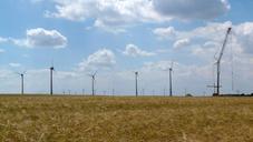 wind-turbine-cornfield-assembly-382913.jpg