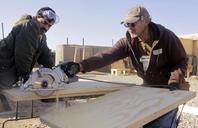 men-working-construction-sawing-978395.jpg