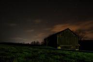 Farm_House_at_Night_Under_Sky_Filled_with_Stars.jpg