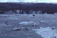 Glacier with ice rocks on ground.jpg