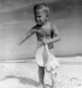 Chad_Wade_Brome_holding_a_horse_conch_shell:_Sanibel_Island,_Florida.jpg