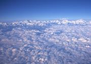 alpine-landscape-with-peaks-covered-by-snow-and-clouds.jpg